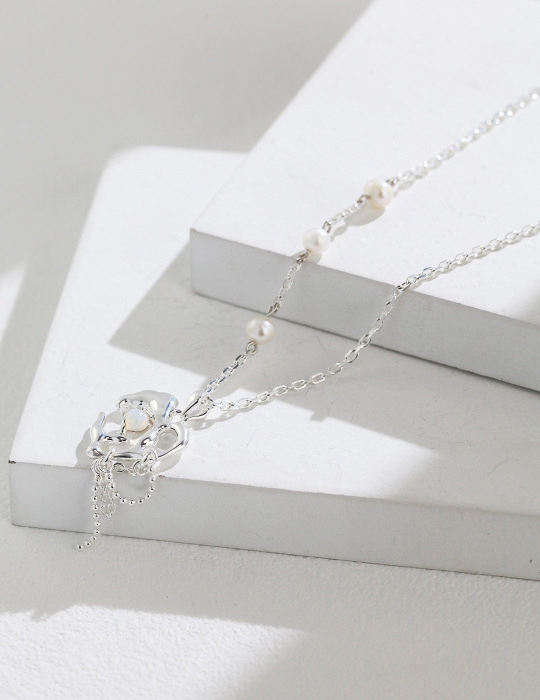Drop necklace with small pearls, silver & gold