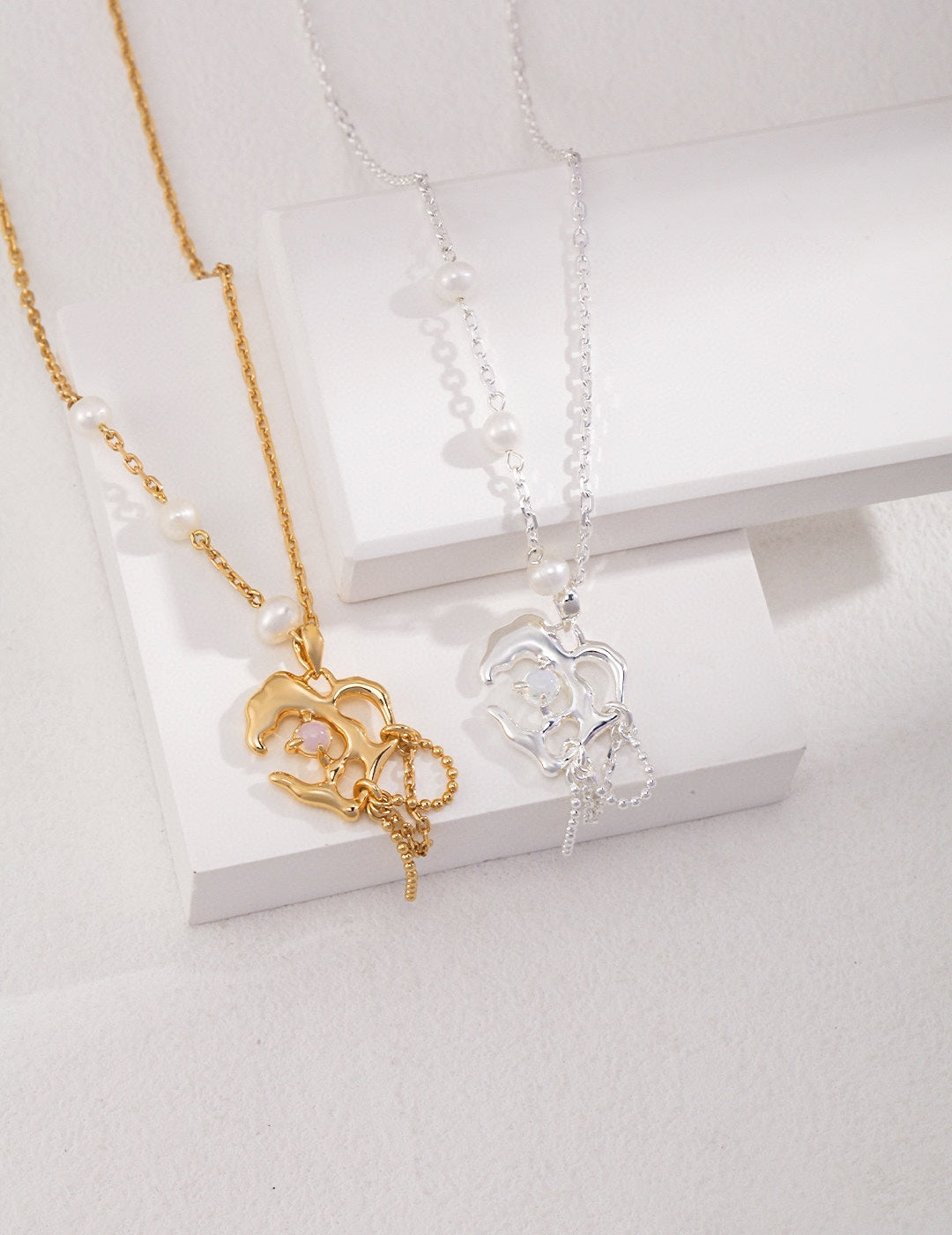 Drop necklace with small pearls, silver & gold