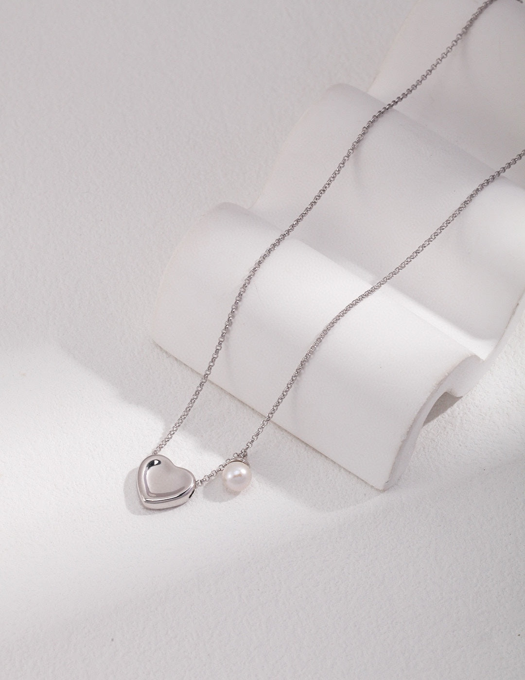 Heart with single pearl necklace, silver & gold