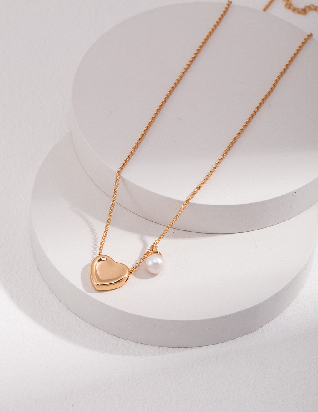 Heart with single pearl necklace, silver & gold