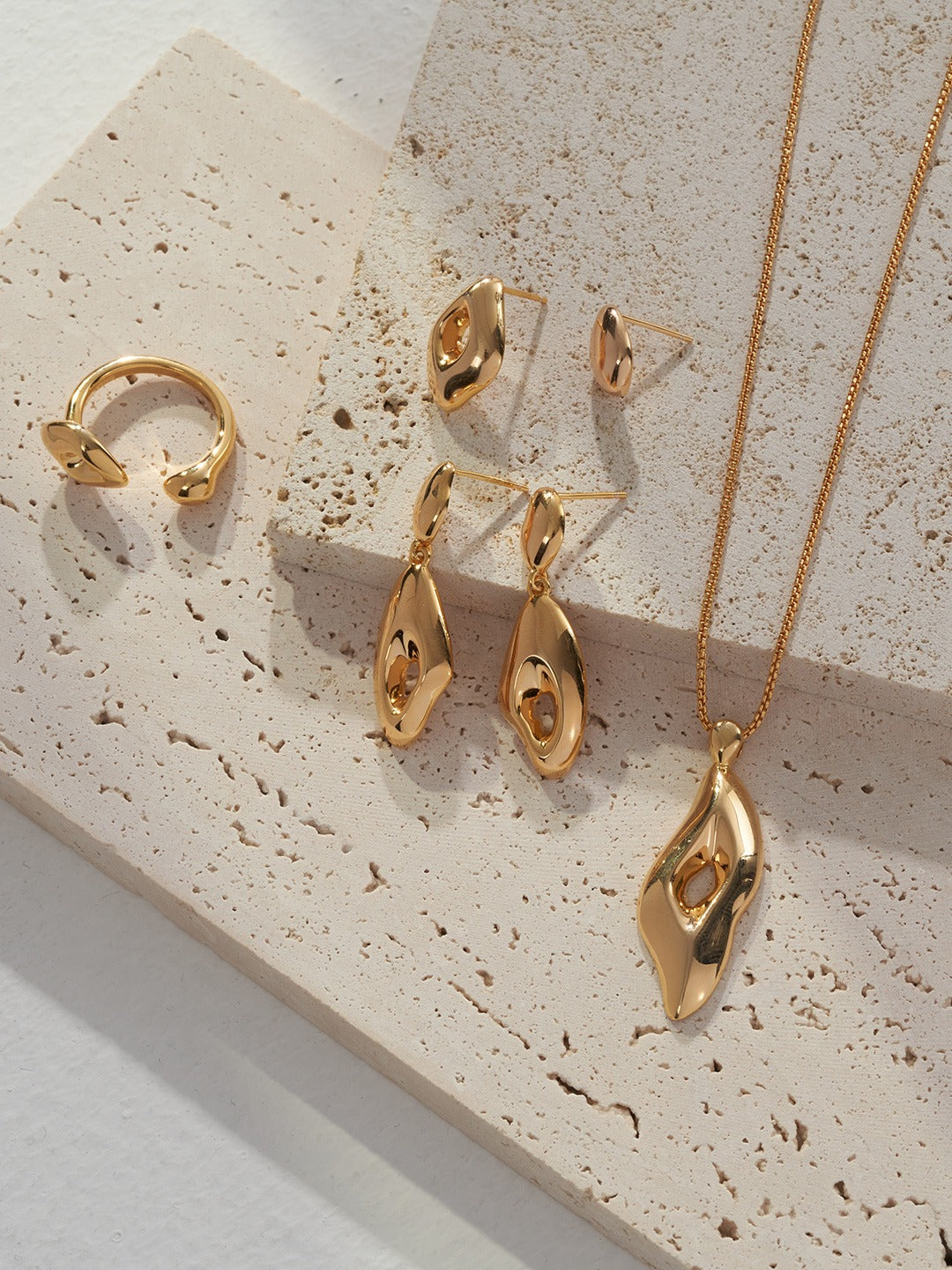 Long Hollowed Asymmetrical Pendant Necklace