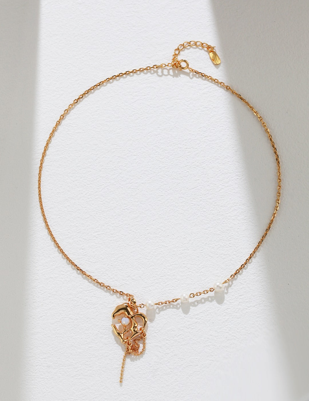 Drop necklace with small pearls, silver & gold