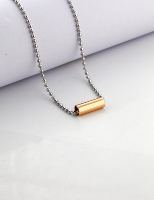 Elegant Gold Cylinder Pendant on Sleek Chain Necklace