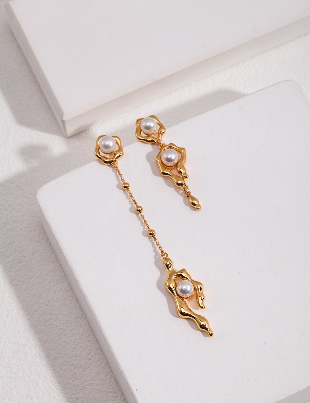 Long style gold pearl earrings