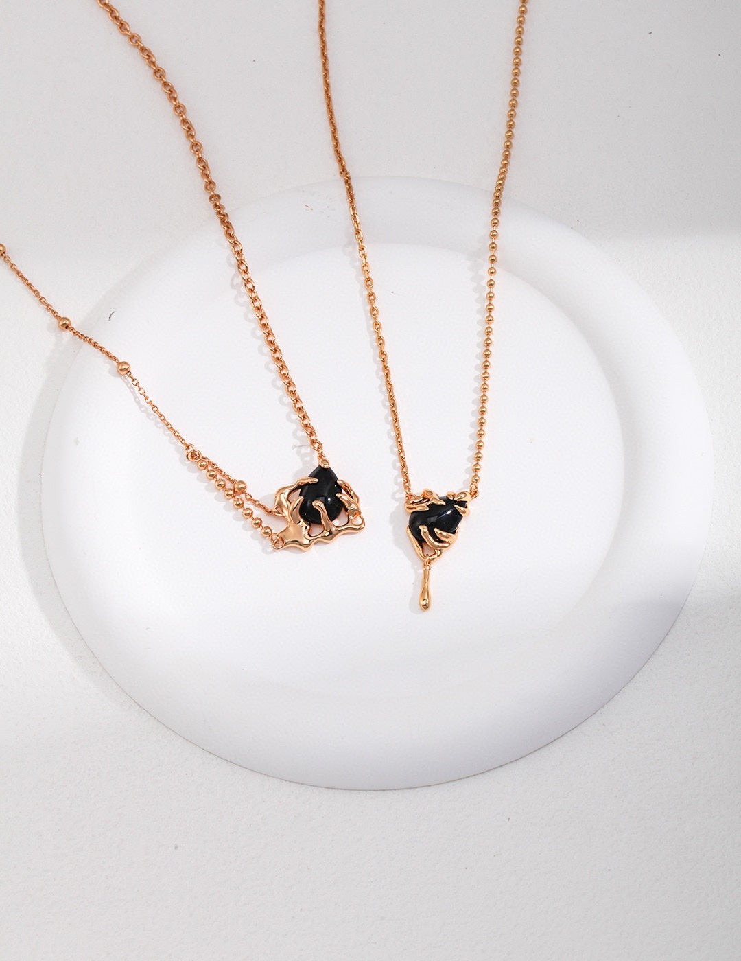 Black gemstone necklace, silver & gold