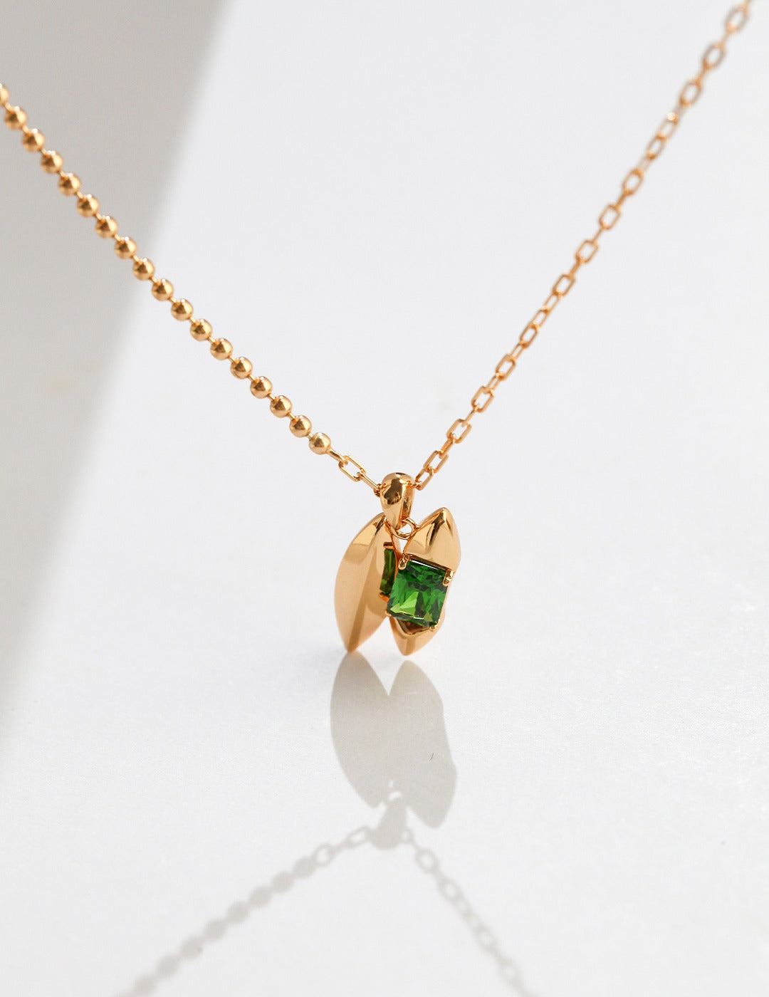 Contemporary Green Gemstone Necklace with Unique Spindle Pendant