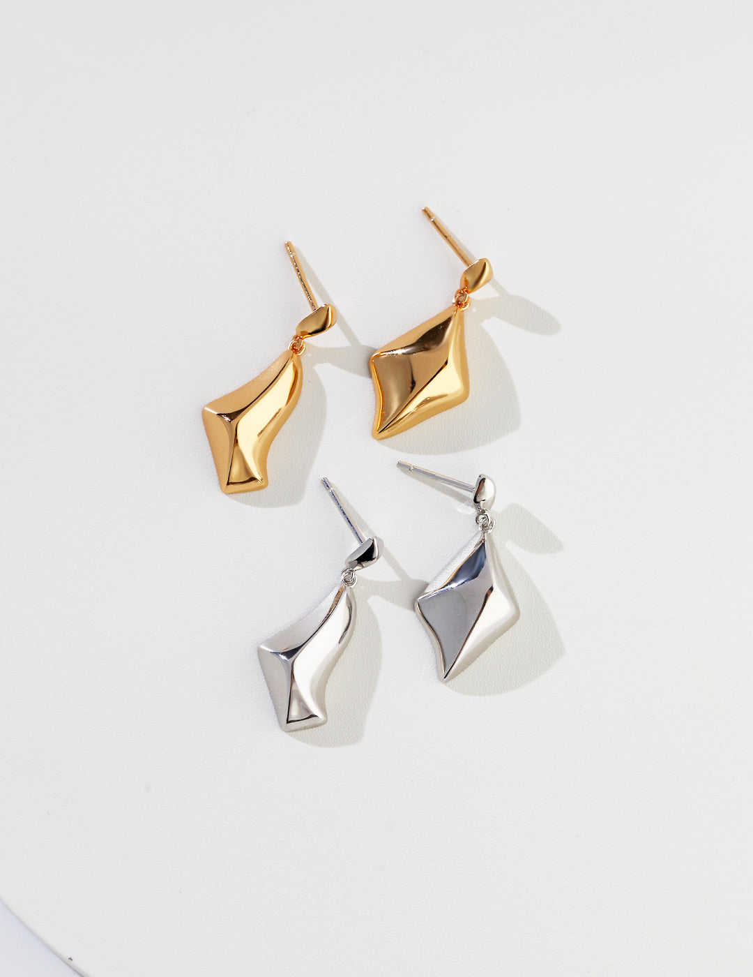 Irregular pyramid earrings, gold & silver