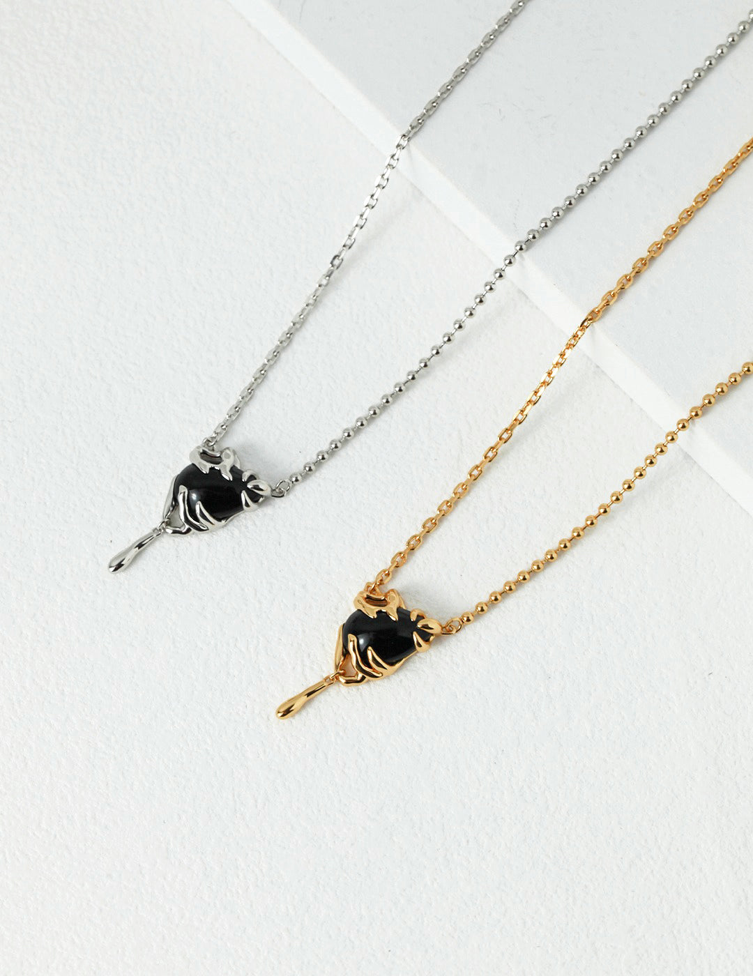 Black gemstone necklace, silver & gold