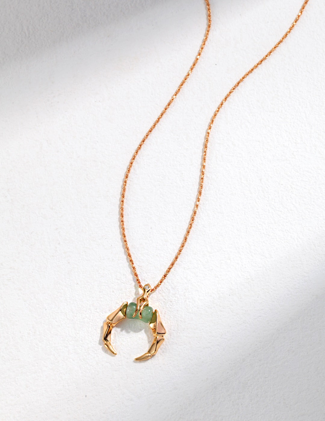 Nature-Inspired Green Aventurine Horn Pendant on Golden Necklace