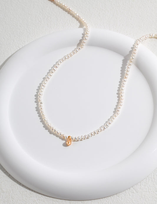 Small Gold Pearl Pendant on Potato Pearl Strand Necklace by Señorita J