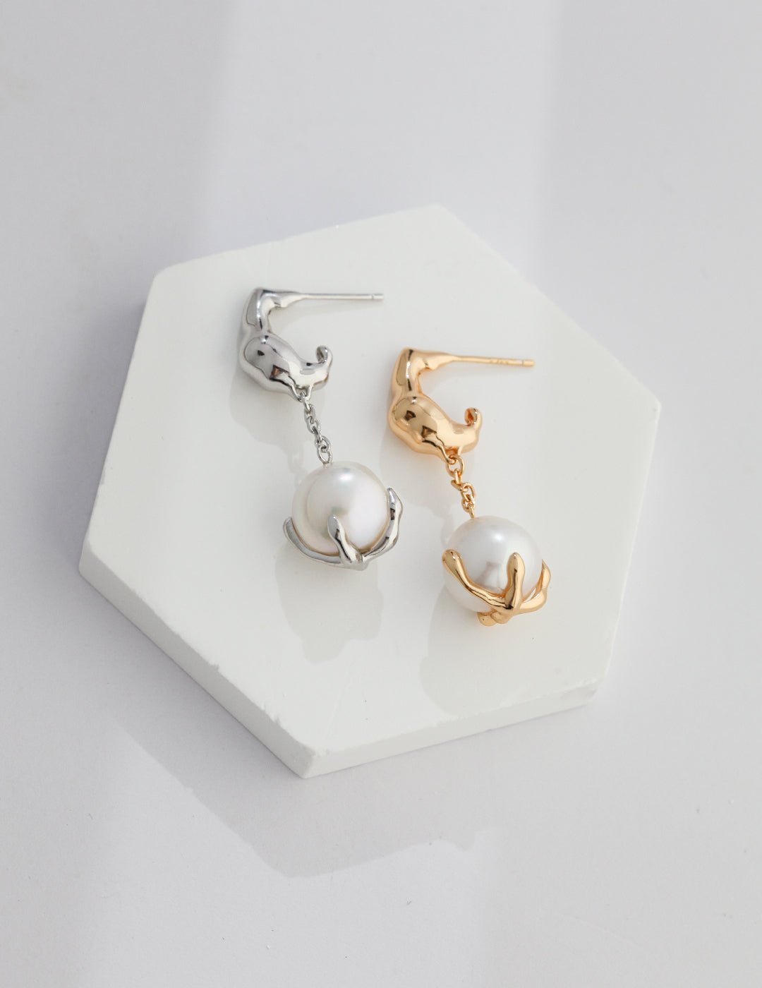 Nature inspired pearl earrings dangle in silver and gold