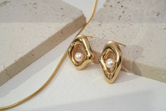Elegant hollow style pearl earrings with 18K gold