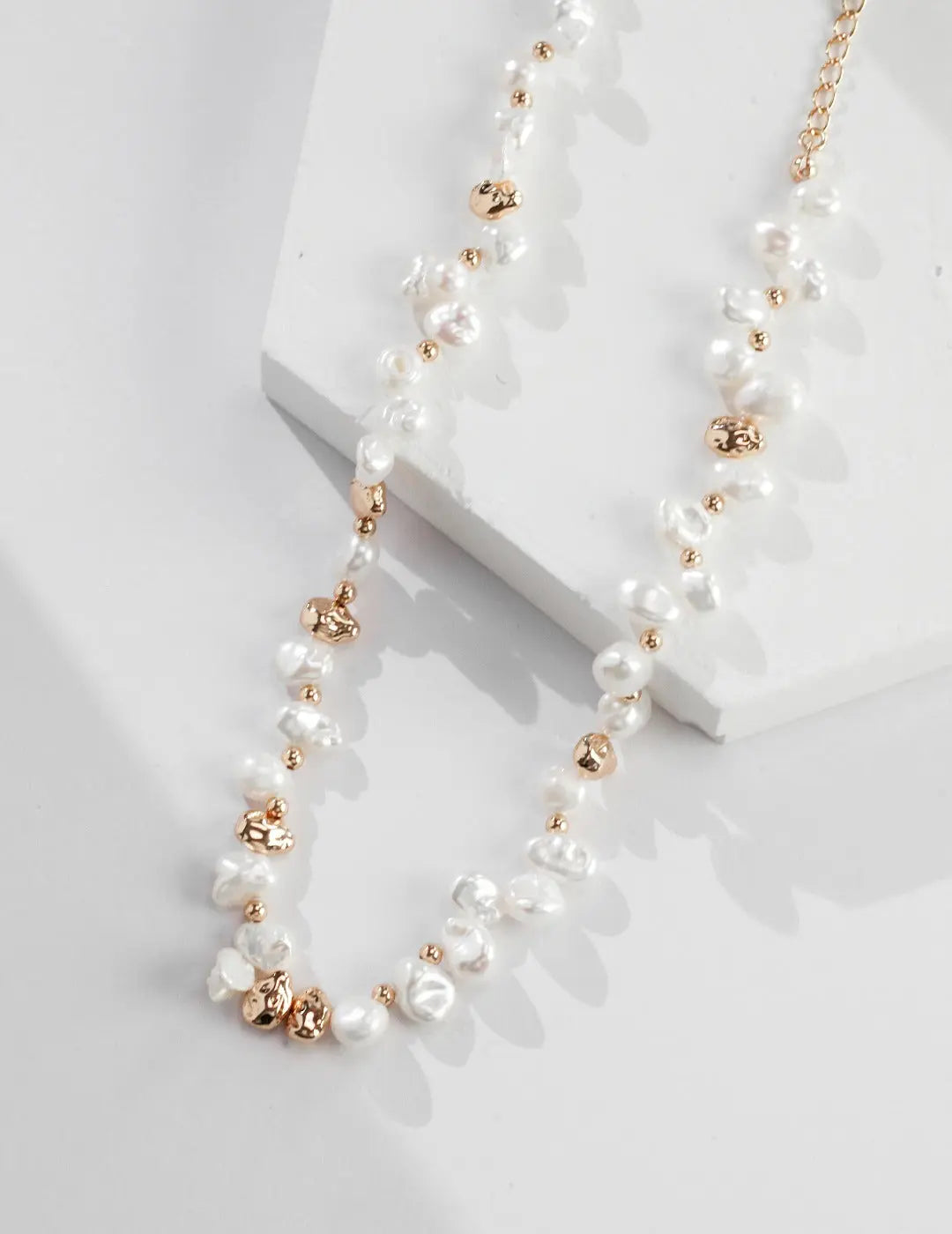 natural pearl necklace with silver beads and clasp