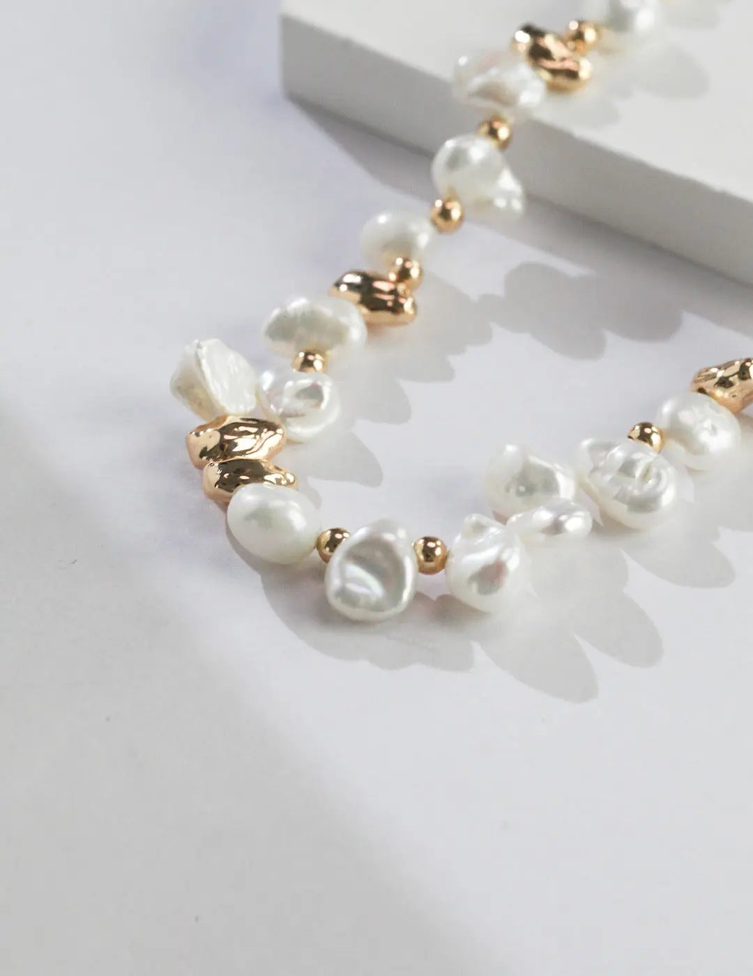 natural pearl necklace with silver beads and clasp