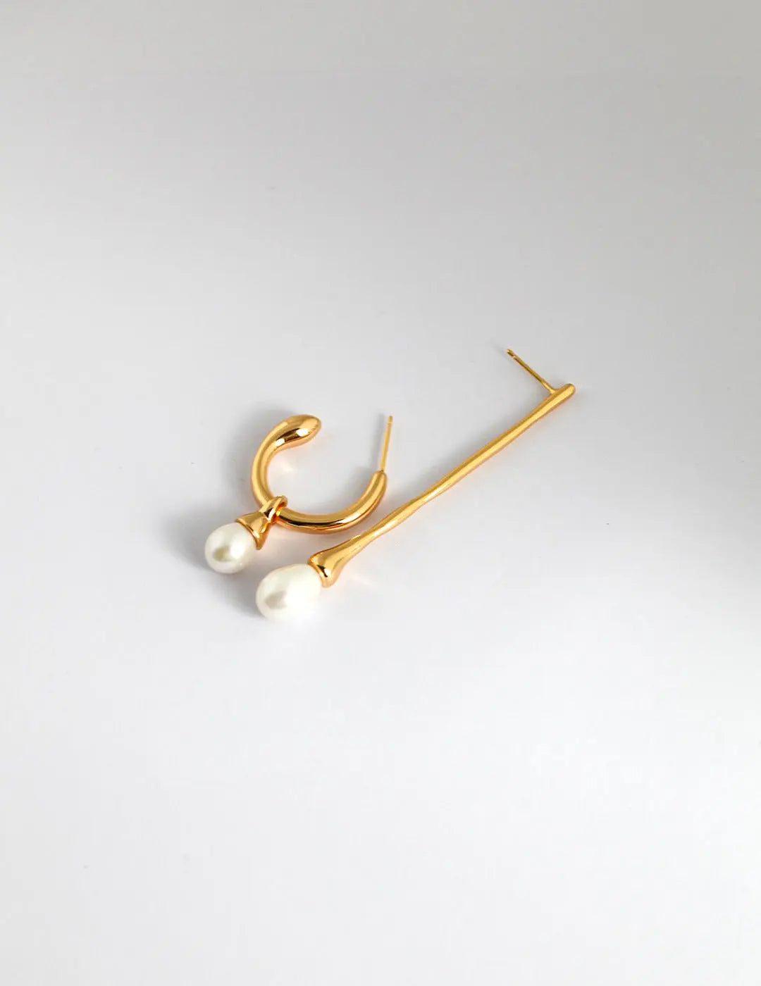 Gold vermeil earrings with Asymmetric Minimalist design that comes with Pearls