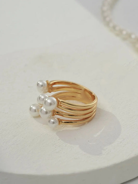 four strand sterling silver ring in gold vermeil with freshwater pearls